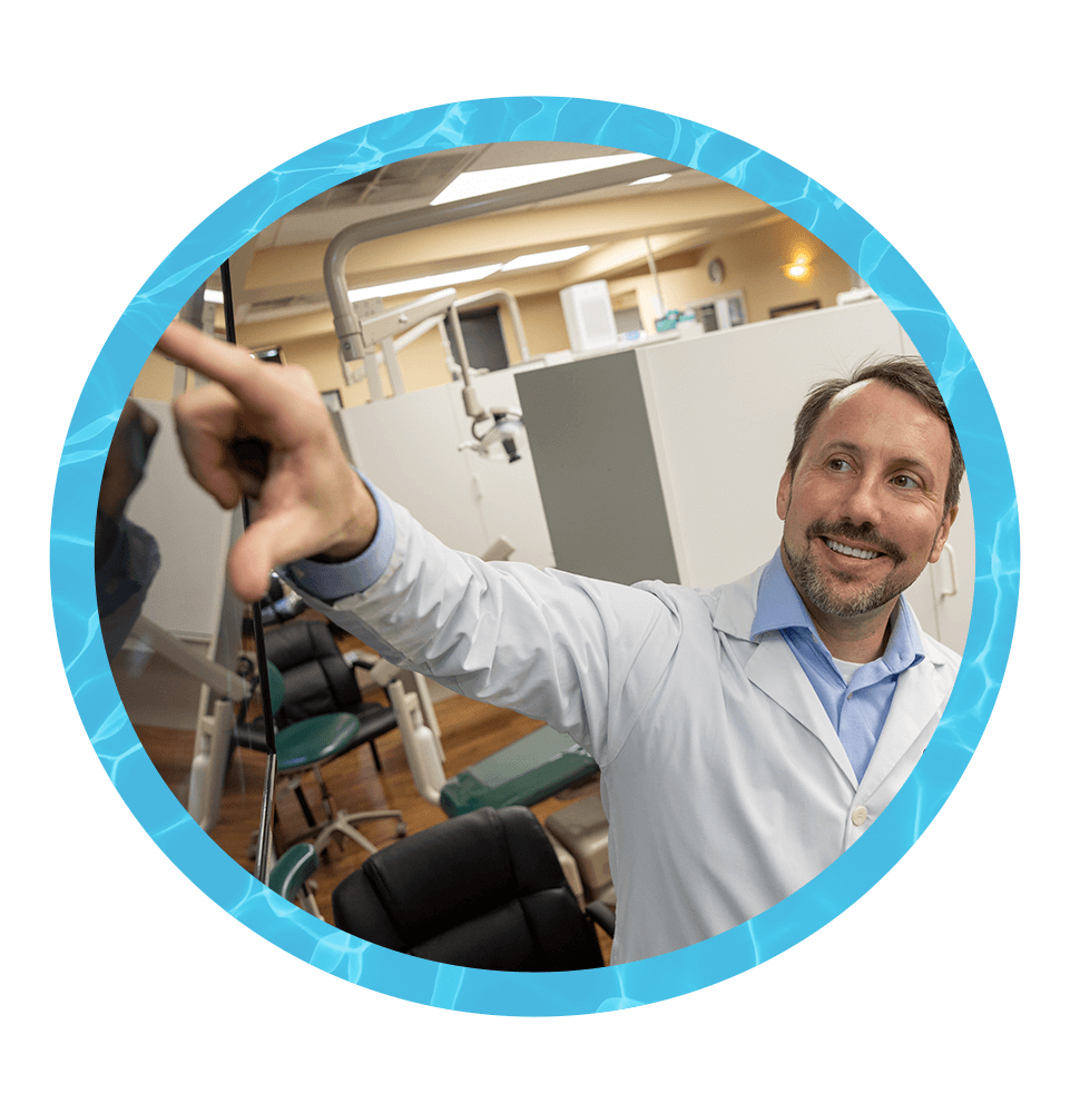 Doctor Pointing at dental X-ray