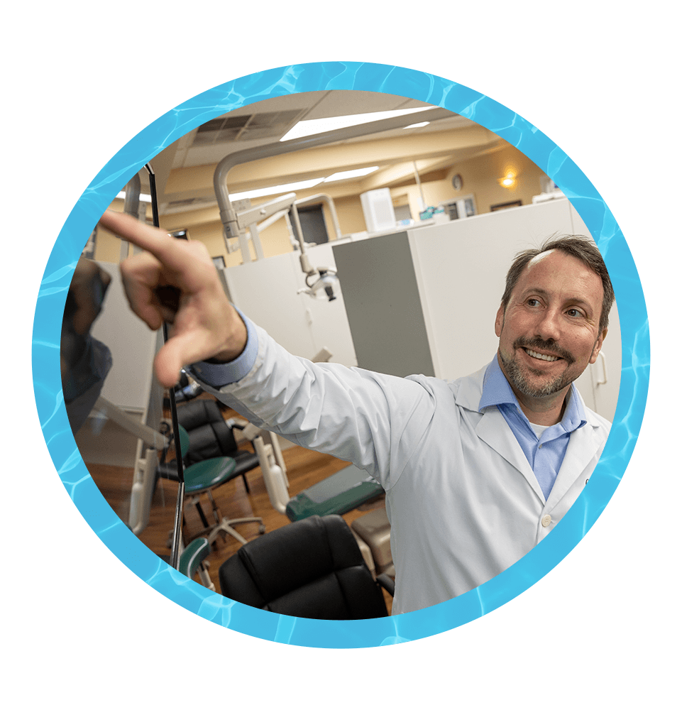 Doctor Pointing at x-ray