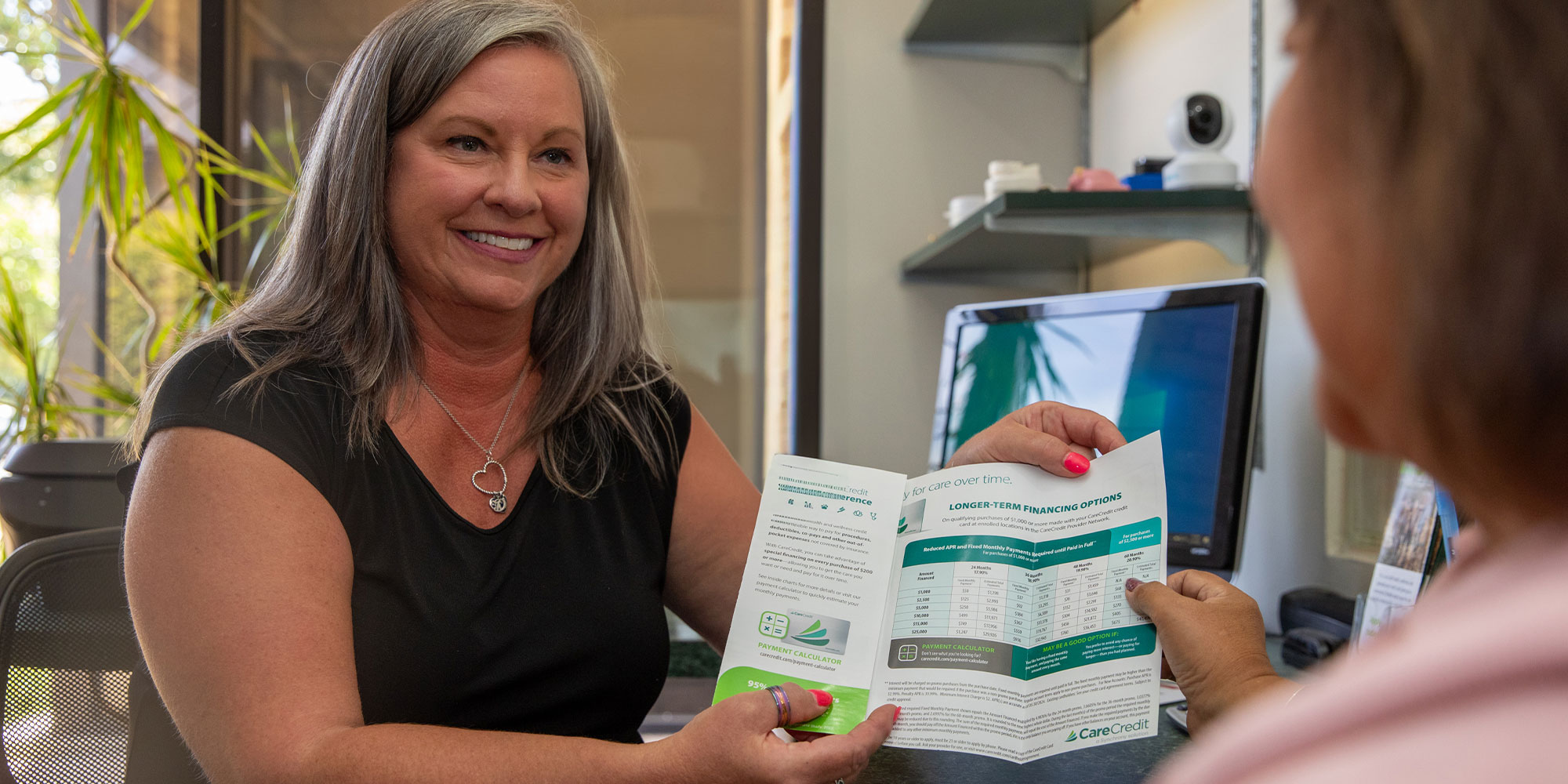 team member Showing Patient insurance forms